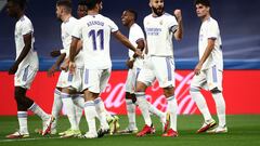 1-0. Karim Benzema celebrates