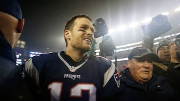 (FILES) This file photo taken on January 22, 2017 shows quarterback Tom Brady #12 of the New England Patriots after defeating the Pittsburgh Steelers 36-17 to win the AFC Championship Game at Gillette Stadium in Foxboro, Massachusetts.  
 New England Patriots quarterback Tom Brady joked January 30, 2017 that he had imposed a media blackout on his father after he ripped into NFL chief Roger Goodell. / AFP PHOTO / GETTY IMAGES NORTH AMERICA / Jim Rogash