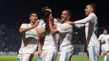 MADRID, SPAIN - OCTOBER 26: Marco Asensio of Real Madrid CF celebrates with teammates after scoring his team&Otilde;s opening goal from a penalty kick during the Copa del Rey, Round of 32, First Leg match between Fuenlabrada and Real Madrid at Estadio Fer