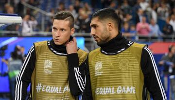 Emre Can of Germany speaks with Julian Draxler of Germany