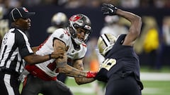 NEW ORLEANS, LOUISIANA - SEPTEMBER 18: Marcus Maye #6 of the New Orleans Saints argues with Mike Evans #13 of the Tampa Bay Buccaneers on the field during the second half of the game at Caesars Superdome on September 18, 2022 in New Orleans, Louisiana.   Chris Graythen/Getty Images/AFP