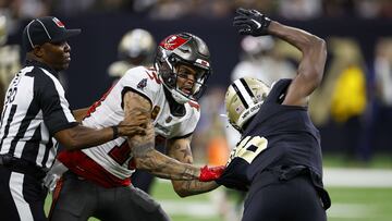 NEW ORLEANS, LOUISIANA - SEPTEMBER 18: Marcus Maye #6 of the New Orleans Saints argues with Mike Evans #13 of the Tampa Bay Buccaneers on the field during the second half of the game at Caesars Superdome on September 18, 2022 in New Orleans, Louisiana. Chris Graythen/Getty Images/AFP