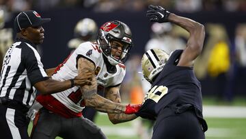 NEW ORLEANS, LOUISIANA - SEPTEMBER 18: Marcus Maye #6 of the New Orleans Saints argues with Mike Evans #13 of the Tampa Bay Buccaneers on the field during the second half of the game at Caesars Superdome on September 18, 2022 in New Orleans, Louisiana.   Chris Graythen/Getty Images/AFP