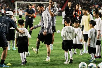 Lionel Messi was fit enough to join a children's session at Hong Kong Stadium on Saturday.