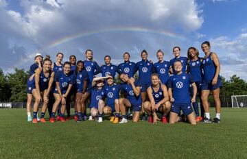 The USWNT poses for a photo with a rainbow during a training session at the practice fields on July 9, 2021 in Miyazaki, Japan.