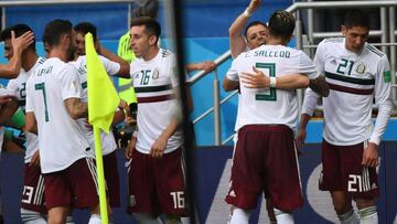 Mexico's forward Javier Hernandez (3R) celebrates scoring their second goal during the Russia 2018 World Cup Group F football match between South Korea and Mexico at the Rostov Arena in Rostov-On-Don on June 23, 2018. / AFP PHOTO / Khaled DESOUKI / R