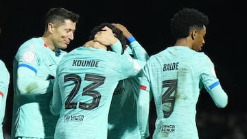 Barcelona's French defender #23 Jules Kounde (C) celebrates scoring his team's second goal with teammates during the Spanish Copa del Rey (King's Cup) football match between Unionistas de Salamanca CF and FC Barcelona at Reina Sofia municipal stadium in Salamanca on January 18, 2024. (Photo by CESAR MANSO / AFP)