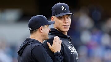 NEW YORK, NEW YORK - JUNE 24: Aaron Judge #99 (R) and manager Aaron Boone #17 of the New York Yankees celebrate after defeating the Texas Rangers at Yankee Stadium on June 24, 2023 in the Bronx borough of New York City. Jim McIsaac/Getty Images/AFP (Photo by Jim McIsaac / GETTY IMAGES NORTH AMERICA / Getty Images via AFP)
