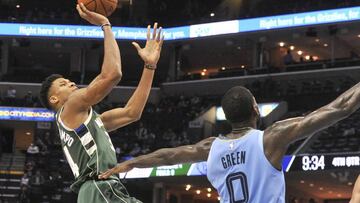 Jan 16, 2019; Memphis, TN, USA; Milwaukee Bucks forward Giannis Antetokounmpo (34) shoots against Memphis Grizzlies forward JaMychal Green (0) during the second half at FedExForum. The Milwaukee Bucks defeated the Memphis Grizzlies 111-101. Mandatory Credit: Justin Ford-USA TODAY Sports
