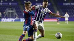 VALLADOLID, SPAIN - NOVEMBER 27: Bruno of Real Valladolid battles for possession with Dani Gomez of Levante during the La Liga Santander match between Real Valladolid CF and Levante UD at Estadio Municipal Jose Zorrilla on November 27, 2020 in Valladolid,