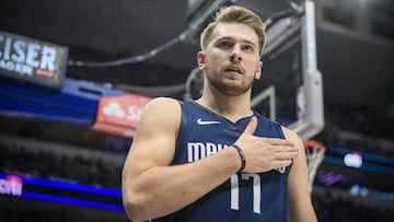 Dallas Mavericks guard Luka Doncic (77) reacts to making a basket against the New York Knicks during the second quarter at the American Airlines Center. Mandatory Credit: Jerome Miron-USA TODAY Sports