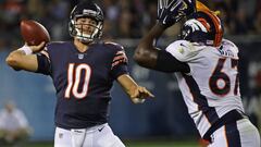 CHICAGO, IL - AUGUST 10: Mitchell Trubisky #10 of the Chicago Bears passes under pressure from Shakir Soto #67 of the Denver Broncos during a preseason game at Soldier Field on August 10, 2017 in Chicago, Illinois. The Broncos defeated the Bears 24-17.   Jonathan Daniel/Getty Images/AFP
 == FOR NEWSPAPERS, INTERNET, TELCOS &amp; TELEVISION USE ONLY ==