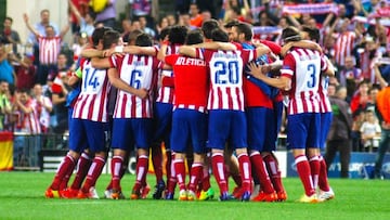 MADRID, SPAIN - APRIL 9: Players of Atletico Madrid celebrate their victory after the UEFA Champions League quarter-final second leg soccer match between Atletico Madrid and Barcelona at Vicente Calderon Stadium in Madrid, Spain on April 9, 2014. (Photo b