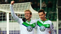 Schuerrle fires Wolfsburg into Champions League last eight