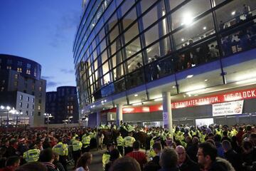 Police guard the stadium entrances as the kick off is delayed due to crowd safety issues ahead of the UEFA Europa League Group H football match between Arsenal and FC Cologne