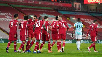 Soccer Football - Premier League - Liverpool v Wolverhampton Wanderers - Anfield, Liverpool, Britain - December 6, 2020 Liverpool's Mohamed Salah celebrates scoring their first goal with teammates Pool via REUTERS/Jon Super EDITORIAL USE ONLY. No use