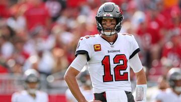 TAMPA, FLORIDA - JANUARY 01: Tom Brady #12 of the Tampa Bay Buccaneers looks on during the third quarter against the Carolina Panthers at Raymond James Stadium on January 01, 2023 in Tampa, Florida.   Mike Ehrmann/Getty Images/AFP (Photo by Mike Ehrmann / GETTY IMAGES NORTH AMERICA / Getty Images via AFP)