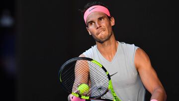 Spain's Rafael Nadal prepares to serve during their men's singles second round match against Argentina's Leonardo Mayer on day three of the Australian Open tennis tournament in Melbourne on January 17, 2018. / AFP PHOTO / Paul Crock / -- IM