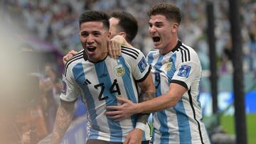 Argentina's midfielder #24 Enzo Fernandez celebrates scoring his team's second goal with his teammates during the Qatar 2022 World Cup Group C football match between Argentina and Mexico at the Lusail Stadium in Lusail, north of Doha on November 26, 2022. (Photo by JUAN MABROMATA / AFP)