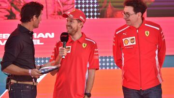 Mark Webber, Sebastian Vettel y Mattia Binotto, jefe de Ferrari en Australia 2019.