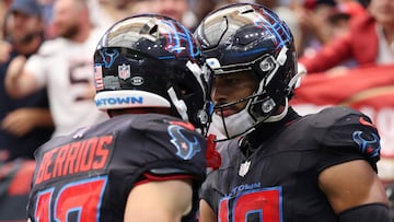HOUSTON, TEXAS - OCTOBER 26: Xavier Hutchinson #19 of the Houston Texans celebrates with Braxton Berrios #17 after scoring a touchdown in the third quarter of the game against the San Francisco 49ers at NRG Stadium on October 26, 2025 in Houston, Texas.   Tim Warner/Getty Images/AFP (Photo by Tim Warner / GETTY IMAGES NORTH AMERICA / Getty Images via AFP)
