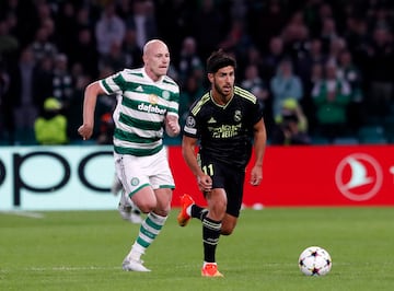 Aaron Mooy y Marco Asensio.