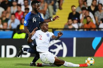 England's Aaron Wan-Bissaka tackles France forward Jonathan Bamba during the U21 European Championships.