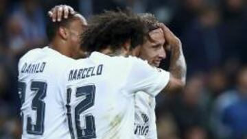 Danilo y Marcelo celebran con Modric el gol del croata a pase del lateral brasileño.
