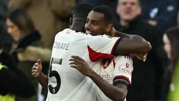 Liverpool's Swedish striker #09 Alexander Isak (R) celebrates with Liverpool's French defender #05 Ibrahima Konate (L) after scoring the opening goal of the English Premier League football match between West Ham United and Liverpool at the London Stadium, in London on November 30, 2025. (Photo by Ben STANSALL / AFP) / RESTRICTED TO EDITORIAL USE. No use with unauthorized audio, video, data, fixture lists, club/league logos or 'live' services. Online in-match use limited to 120 images. An additional 40 images may be used in extra time. No video emulation. Social media in-match use limited to 120 images. An additional 40 images may be used in extra time. No use in betting publications, games or single club/league/player publications. /