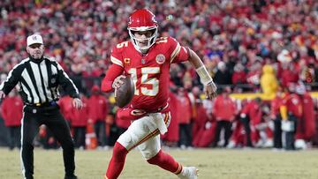Jan 26, 2025; Kansas City, MO, USA; Kansas City Chiefs quarterback Patrick Mahomes (15) rushes the ball against the Buffalo Bills during the first half in the AFC Championship game at GEHA Field at Arrowhead Stadium. Mandatory Credit: Denny Medley-Imagn Images