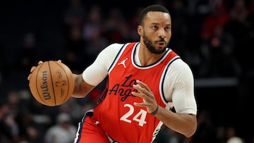 John Collins heads to Los Angeles while Norman Powell will spend the new season in the Eastern Conference in a three-team trade.