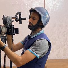 What are the dangers of being a journalist in a warzone like Gaza?