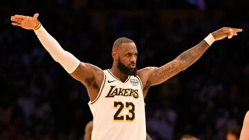 LOS ANGELES, CALIFORNIA - OCTOBER 26: LeBron James #23 of the Los Angeles Lakers asks for the crowd to quiet down as Anthony Davis #3 shots free throws against the Sacramento Kings in the fourth quarter at Crypto.com Arena on October 26, 2024 in Los Angeles, California. NOTE TO USER: User expressly acknowledges and agrees that, by downloading and or using this photograph, User is consenting to the terms and conditions of the Getty Images License Agreement. John McCoy/Getty Images/AFP (Photo by John MCCOY / GETTY IMAGES NORTH AMERICA / Getty Images via AFP)