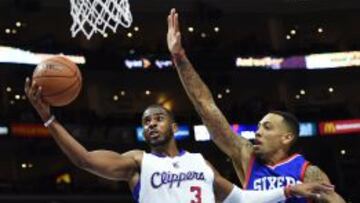 Chris Paul supera a Malcolm Thomas.