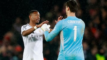 Soccer Football - Champions League - Brest v Real Madrid - Stade de Roudourou, Guingamp, France - January 29, 2025 Real Madrid's Thibaut Courtois celebrates with David Alaba after the match REUTERS/Stephane Mahe