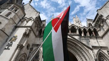 A Palestinian flag is seen, outside London's High Court as judges decide whether the co-founder of Palestine Action can challenge the UK government's ban on the group, in London, Britain, July 30, 2025. REUTERS/Toby Melville