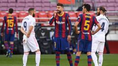 DORTMUND, GERMANY - OCTOBER 24 : Gerard Pique of Barcelona speaks with Karim Benzema of Real Madrid and Sergio Ramos of Real Madrid  during the Bundesliga match between Borussia Dortmund and FC Schalke 04 at Signal Iduna Park on October 24, 2020 in Dortmu