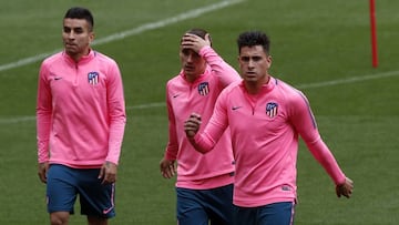 Giménez con Griezmann.