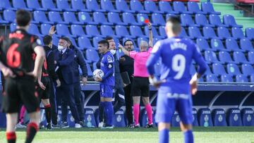 Gonzalez Fuertes, referee of the match see the yellow card to Jose Bordalas, head coach of Getafe CF during La Liga football match played between Getafe CF and Real Sociedad at Coliseum Alfonso Perez on February 14, 2021 in Getafe, Madrid, Spain.
 AFP7 
 