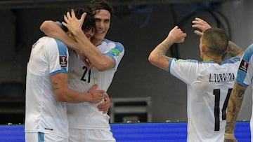 Uruguay's Darwin Nunez (L) celebrates with teammates Uruguay's Edinson Cavani and Lucas Torreira (R) after scoring against Colombia during their closed-door 2022 FIFA World Cup South American qualifier football match at the Metropolitan Stadium