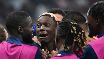 TOPSHOT - France's forward #12 Randal Kolo Muani celebrates with teammates after scoring his team's second goal during the Qatar 2022 World Cup semi-final football match between France and Morocco at the Al-Bayt Stadium in Al Khor, north of Doha on December 14, 2022. (Photo by FRANCK FIFE / AFP) (Photo by FRANCK FIFE/AFP via Getty Images)