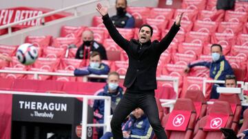 Arsenal's Spanish manager Mikel Arteta reacts during the English Premier League football match between Arsenal and Brighton and Hove Albion at the Emirates Stadium in London on May 23, 2021. (Photo by Alastair Grant / POOL / AFP) / RESTRICTED TO EDIT