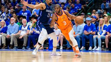 May 8, 2022; Dallas, Texas, USA; Phoenix Suns guard Chris Paul (3) drives to the basket past Dallas Mavericks guard Spencer Dinwiddie (26) during the second quarter during game four of the second round for the 2022 NBA playoffs at American Airlines Center. Mandatory Credit: Jerome Miron-USA TODAY Sports