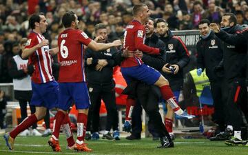 Griezmann celebra su gol con Simeone.