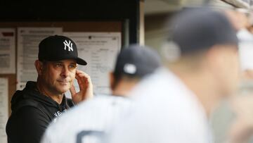 NEW YORK, NEW YORK - AUGUST 16: Manager Aaron Boone #17 of the New York Yankees looks on from the dugout during the first inning against the Tampa Bay Rays at Yankee Stadium on August 16, 2022 in the Bronx borough of New York City. Sarah Stier/Getty Images/AFP
== FOR NEWSPAPERS, INTERNET, TELCOS & TELEVISION USE ONLY ==