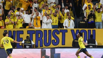 Nassr's French forward #21 Kingsley Coman (R) celebrates after scoring the first goal of the match during the Saudi Pro League football match between Al-Nassr and Al-Ettifaq at the Al-Awwal Park Stadium in Riyadh on April 15, 2026. (Photo by Fayez Nureldine / AFP)