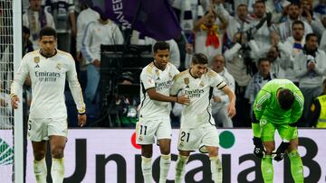 MADRID, 02/12/2023.- El delantero brasileño del Real Madrid Rodrygo celebra su gol (segundo de su equipo) junto a su compañero Brhim Díaz (cd) durante el partido de LaLiga de fútbol equivalente a la jornada 15 de LaLiga que Real Madrid y Granada CF disputan este sábado en el estadio Santiago Bernabéu. EFE/ Mariscal