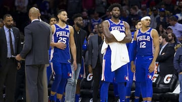 PHILADELPHIA, PA - OCTOBER 30: Ben Simmons #25, Joel Embiid #21, and Tobias Harris #12 of the Philadelphia 76ers look on after Joel Embiid got into a fight with Karl-Anthony Towns #32 of the Minnesota Timberwolves (not pictured) in the third quarter at the Wells Fargo Center on October 30, 2019 in Philadelphia, Pennsylvania. The 76ers defeated the Wolves 117-95. NOTE TO USER: User expressly acknowledges and agrees that, by downloading and or using this photograph, User is consenting to the terms and conditions of the Getty Images License Agreement.   Mitchell Leff/Getty Images/AFP
 == FOR NEWSPAPERS, INTERNET, TELCOS &amp; TELEVISION USE ONLY ==