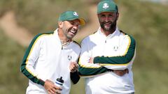 KOHLER, WISCONSIN - SEPTEMBER 22: Sergio Garcia of Spain and team Europe and Jon Rahm of Spain and team Europe laugh during a practice round prior to the 43rd Ryder Cup at Whistling Straits on September 22, 2021 in Kohler, Wisconsin. Warren Little/Getty I