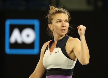 Tennis - Australian Open - Melbourne Park, Melbourne, Australia, February 14, 2021 Romania's Simona Halep celebrates winning her fourth round match against Poland's Iga Swiatek REUTERS/Asanka Brendon Ratnayake